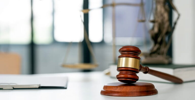 A gavel on a car accident attorney's desk.