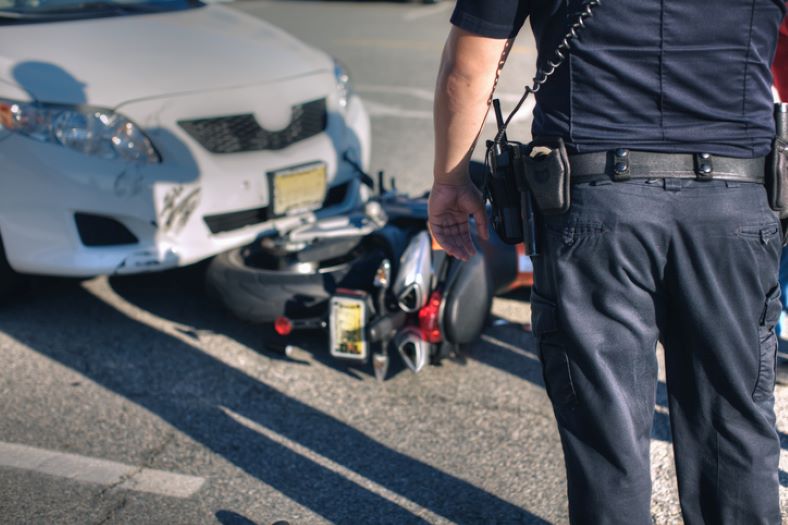 motorcycle accident with white car