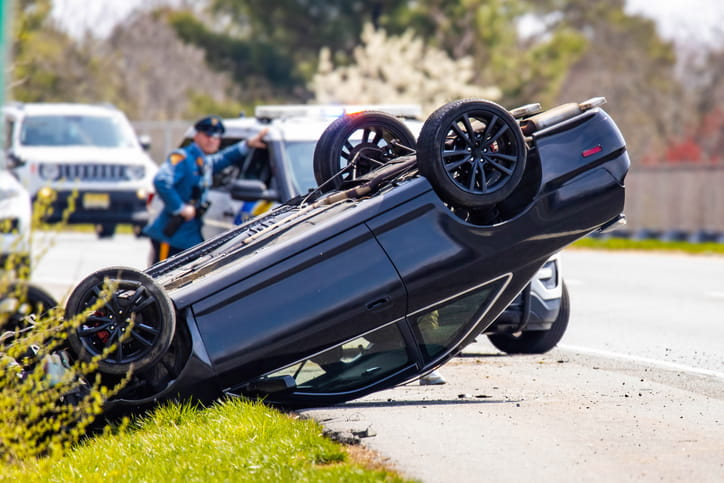 A car flipped over after being in an accident.