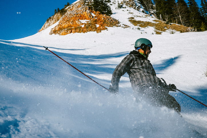 A man skiing on snow.